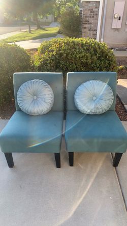 2 chairs with pillows