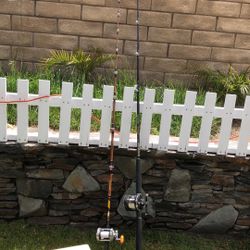 TWO (2)Saltwater Fishing Rods with Reels(Penn & Kencor)Plus a nice Plano Tackle Box with a few lures