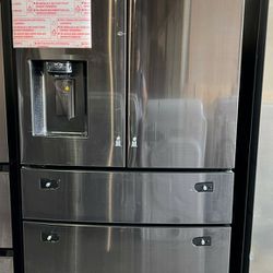Samsung 4 door refrigerator with water and ice 