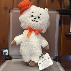 Defected BK7552 14”  BT21 RJ standing plush doll dressed in a signature orange hat and bow tie.