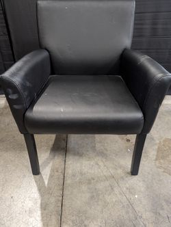 Modern Black Upholstered Armchair with Dark Legs