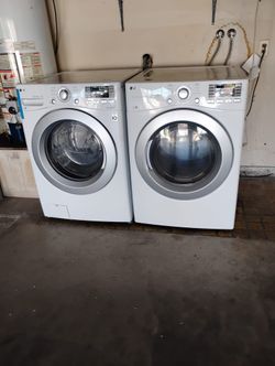 LG washer and gas dryer excellent working condition can also be stacked 27"W 78" stacked on top of each other