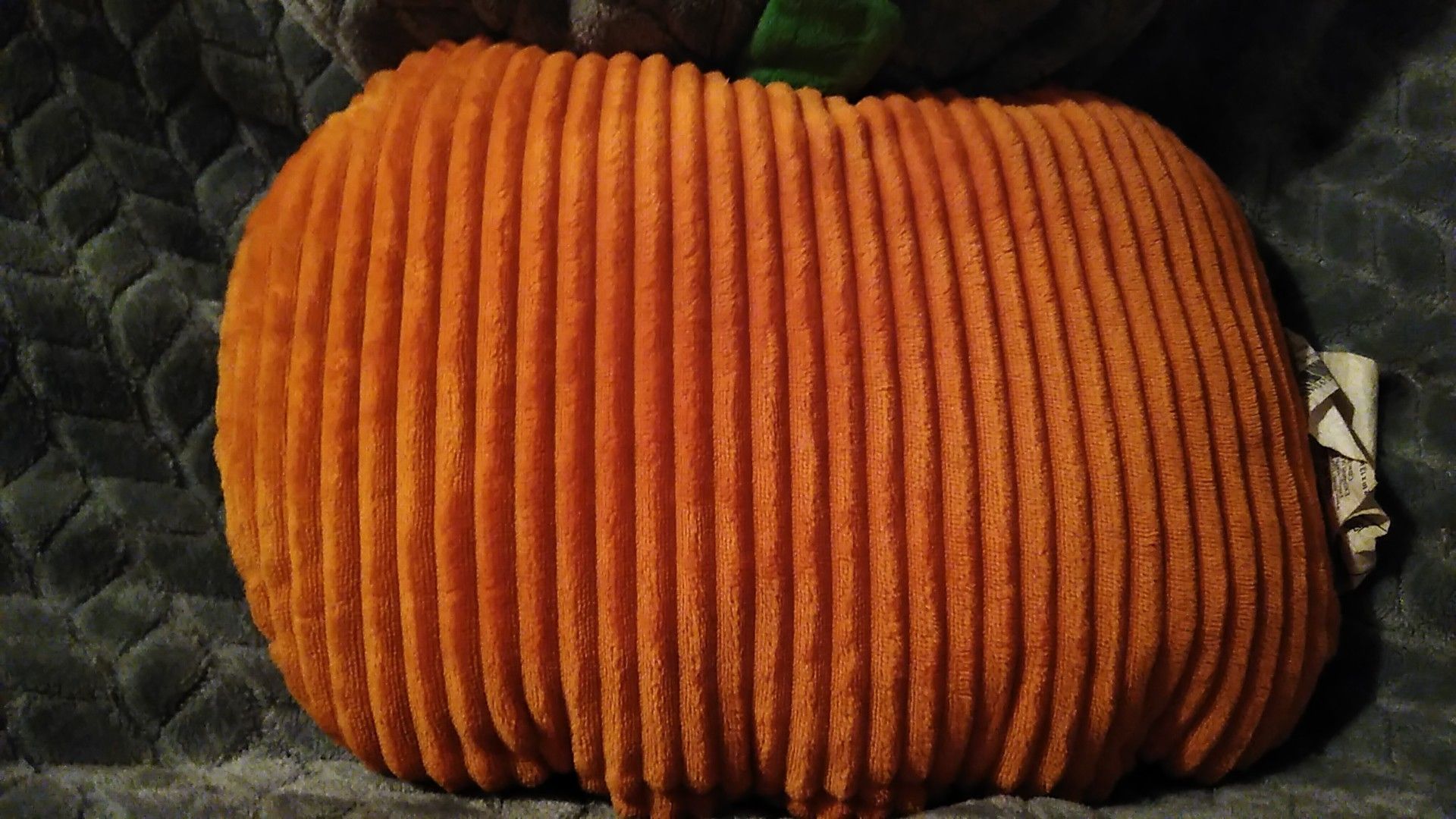Stuffed smiling pumpkin pillow