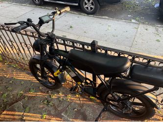 Bicicleta eléctrica negra 2 baterías