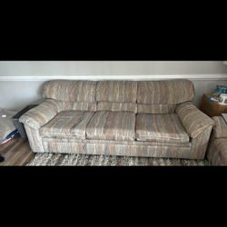 Couch And Reclining Love Seat