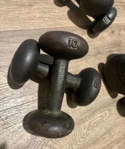 3 pairs of Classic Cast Iron Dumbbells: 8s, 10s and 15s.  Total: 66 pounds
