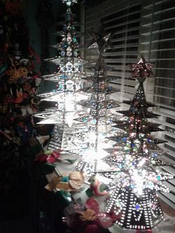3 lighted trees