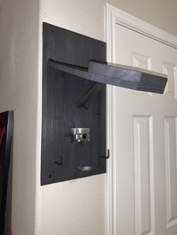 Motorcycle helmet shelf/rack