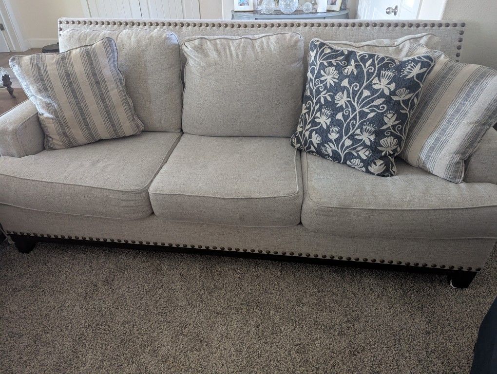 Two Ashley Furniture Sofas