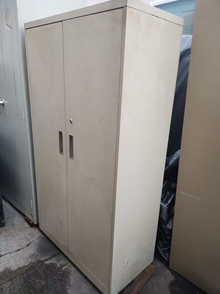 Steelcase Storage Cabinet. 5 Adjustable Shelves. 64.5"H36"W18"D. It's A Heavy Cabinet. Comes With Keys Has Miner Surface Rust. I Can Deliver For Extra