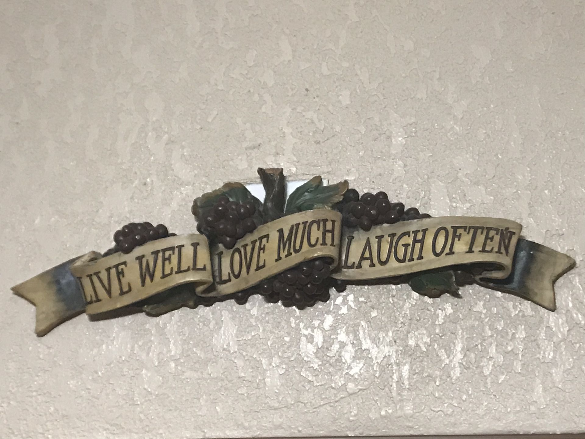 Kitchen ornament “Live Well, Love Much, Laugh Often”