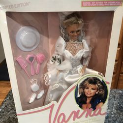 Vanna White Doll Home Shopping Club Bride.  Brand New in original box never opened.  The box has some damage see pictures.  The doll is in perfect con