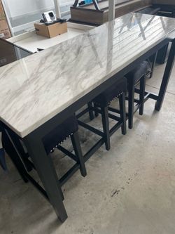 Barstool chairs and table