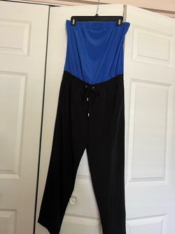 express Blue and Black Strapless Jumpsuit the size is Small it’s from express