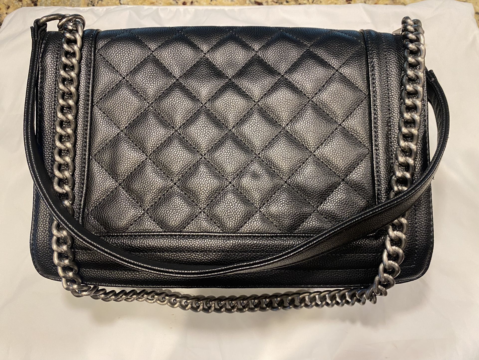 shoulder purse and Silver hardware.