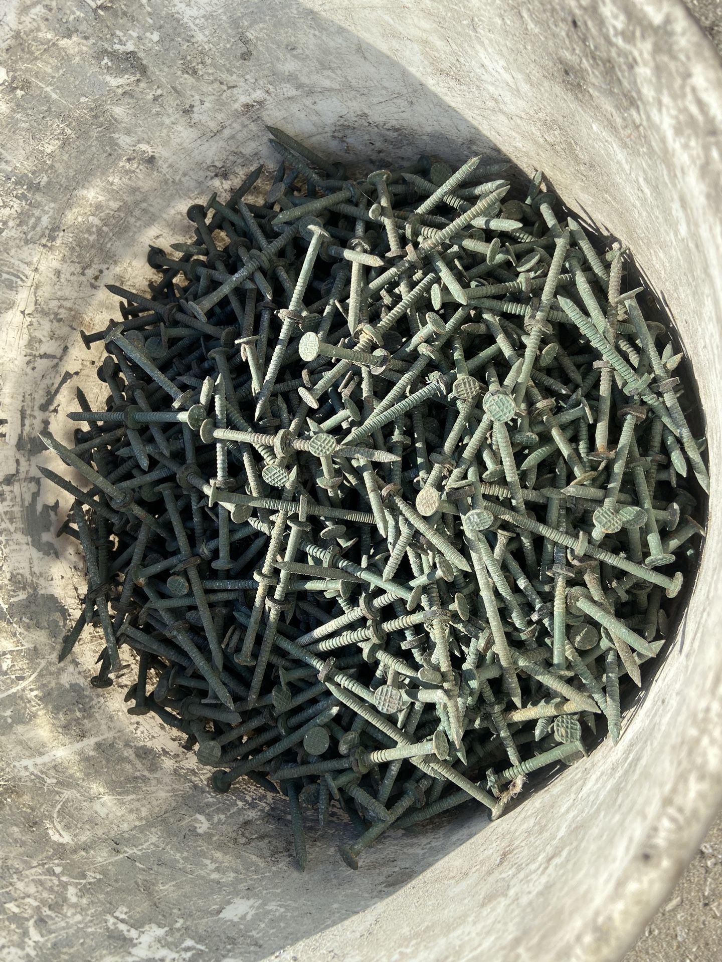 Bucket Of Aluminum Nails
