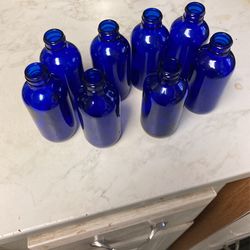 Eight Cobalt Blue Bottles. 