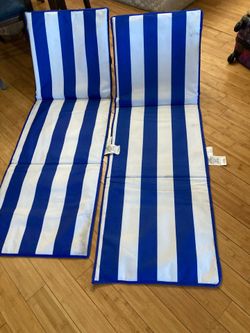 Two outside lounge chairs cover or cushions both for $25