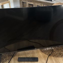 32 Inch TCL TV w/TV Stand