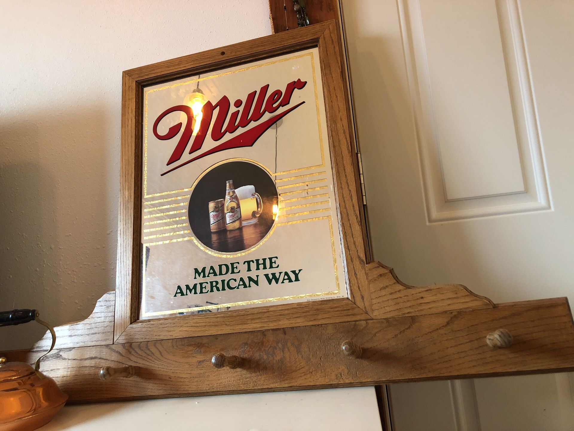 Large Miller beer sign mirror with coat hooks