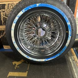 14 INCH WIRE WHEELS. WITH REMINGTON TIRES