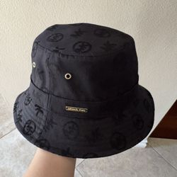 Michael Kors Logo embossed stretch cotton bucket hat. Color: black. One size.