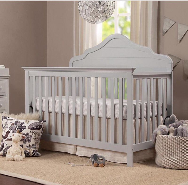 Light grey in convertible crib brand new!