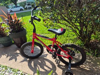 Nice Used Small Rockit 16 Childs Bicycle with training wheels.  4thru6 yrs.