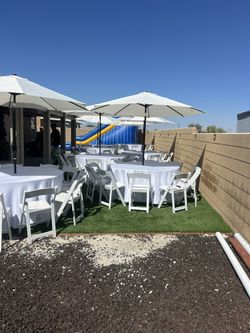 9ft Umbrellas with resin chair set up  Each set includes 1 round table, 10 resin chairs, 1 umbrella r  . E . n .  Ta. L   Adelanto, Victorville, phela