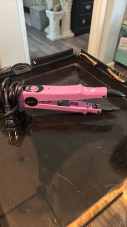Pink heat iron for extensions glue removal
