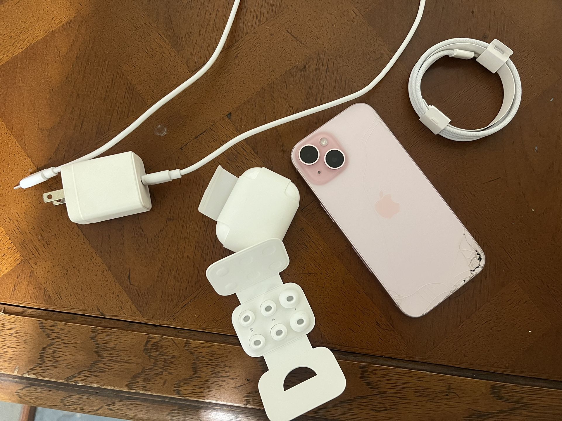 Apple iPhone 15 Mini Pink With Brand New And REAL 2nd Generation Pro AirPods And Charger