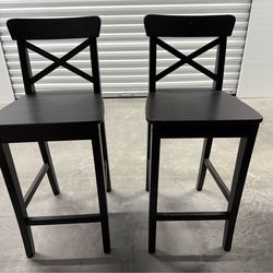 IKEA ROSENTORP bar stools with a classic X-back design