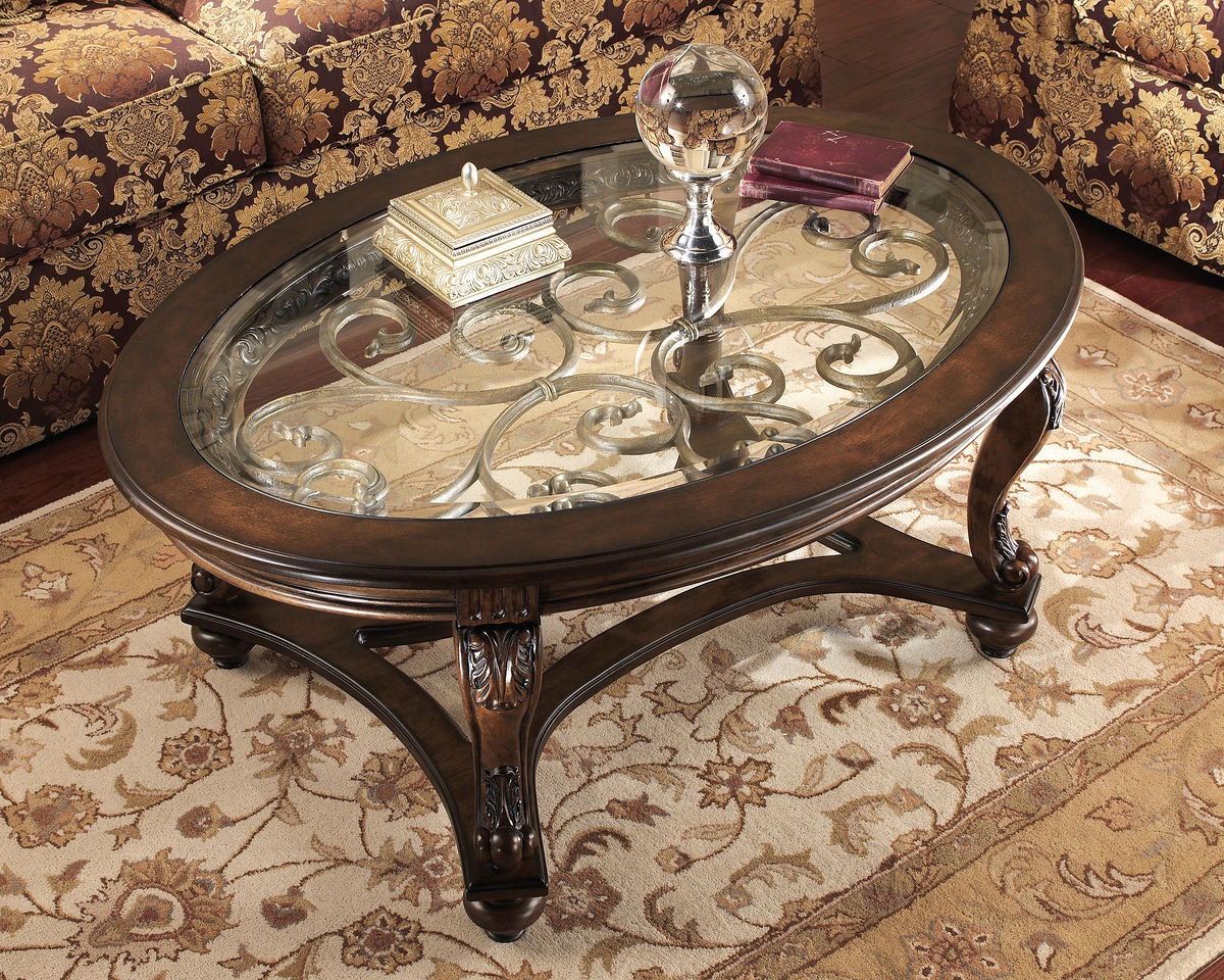 by Ashley  Norcastle Coffee Table  Dark Brown & End Table