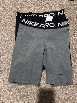5” medium Nike pros black and Grey