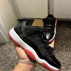 Jordan 11 Retro Low Bred 