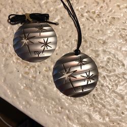 2 David Yurman decorative Christmas ornament tie. Starburst cutouts, silver metal.