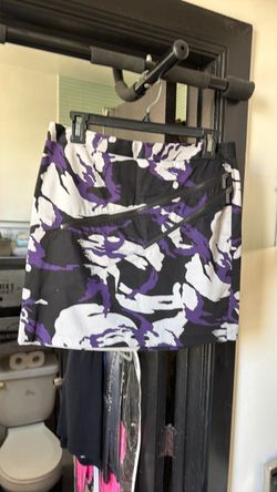 Stylish camo Michael Kors shirt!  Black, purple, grey…great condition!  Size 2.  Cash only.  Pick up only.