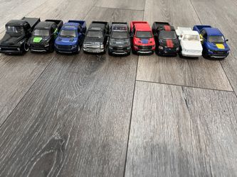 Diecast 1/46 Scale Kinsmart and Jada trucks rams Chevy and ford lot 9 40 dollars for All 9 trucks great condition