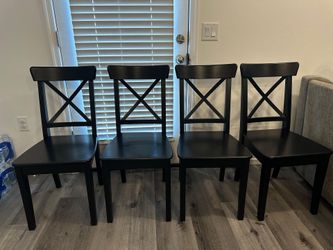 IKEA extendable dining table with 4 chairs