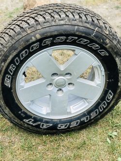 Jeep spare Factory Rim 2007-2009 w/ tire retail $400