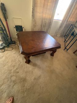 Large Solid Wood Coffee Table with Carved Base