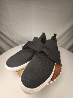 Women's oversized bow slip on shoes.  Size 10