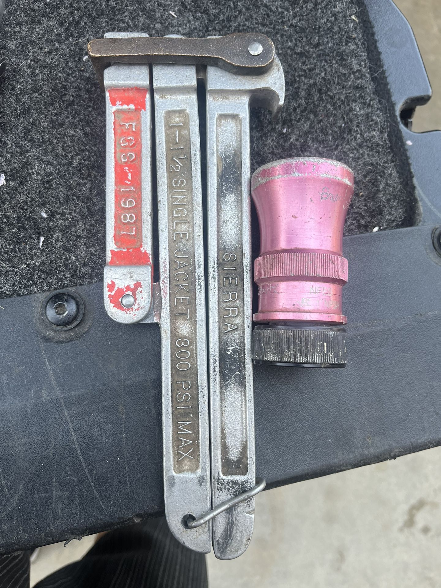Fireman’s Wrench And Nozzle.