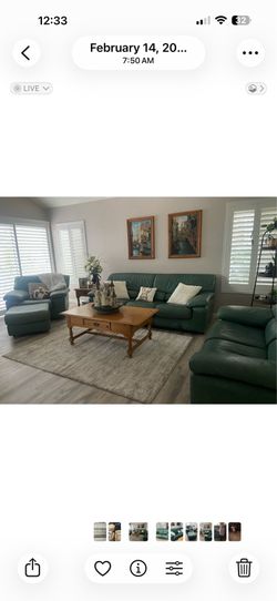 Green leather couches, chair, coffee table, end table and console