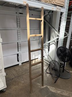 Rustic decorative leaning ladder