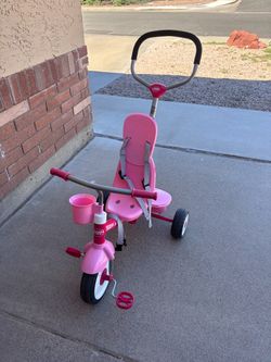 pink tricycle