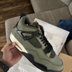 Undefeated Jordan 4s 11.5