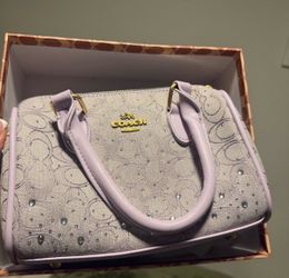 Lavender coach purse