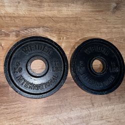 2 11lb weider international iron plates