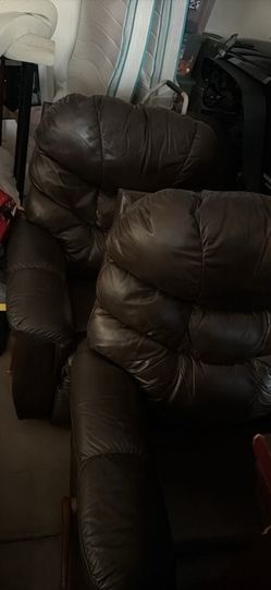 2 brown recliners